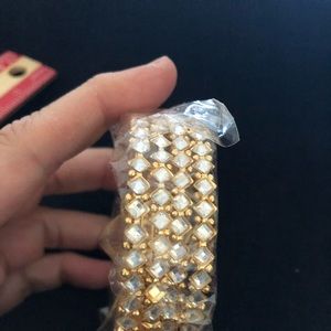 Gold and white bangle. Artificial. Size 2.6